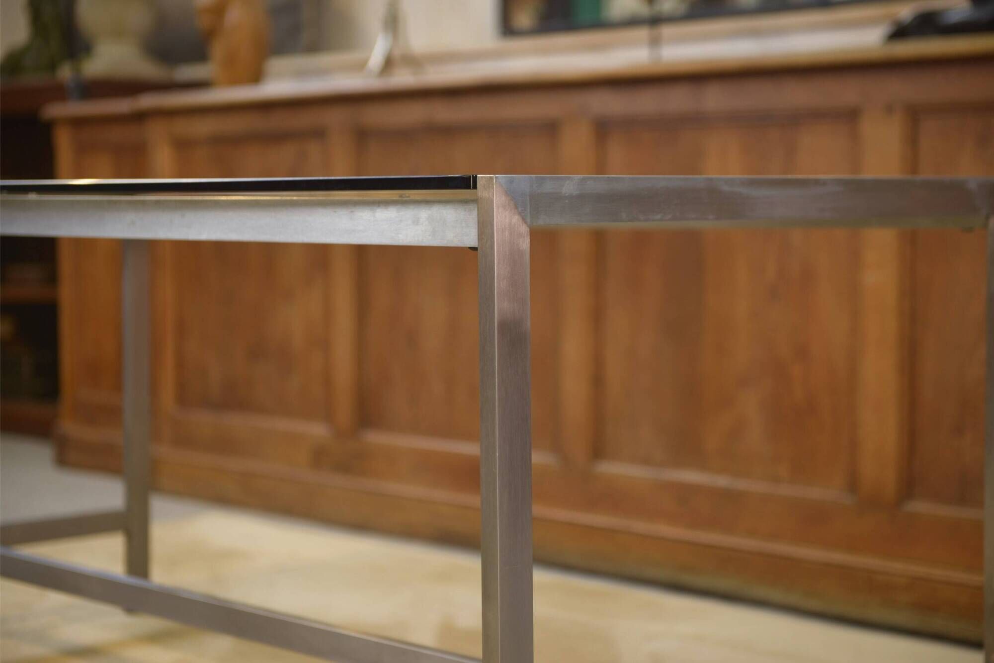 Brushed stainless steel and smoked black glass desk from the 1980s.