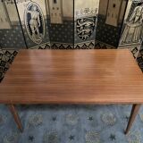 Scandinavian dining table with built-in extensions