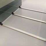 Vintage coffee table in smoked glass, black metal and cast aluminum