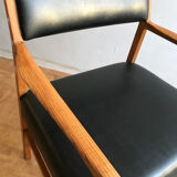 Chair in light teak and black skaï from the 1960s