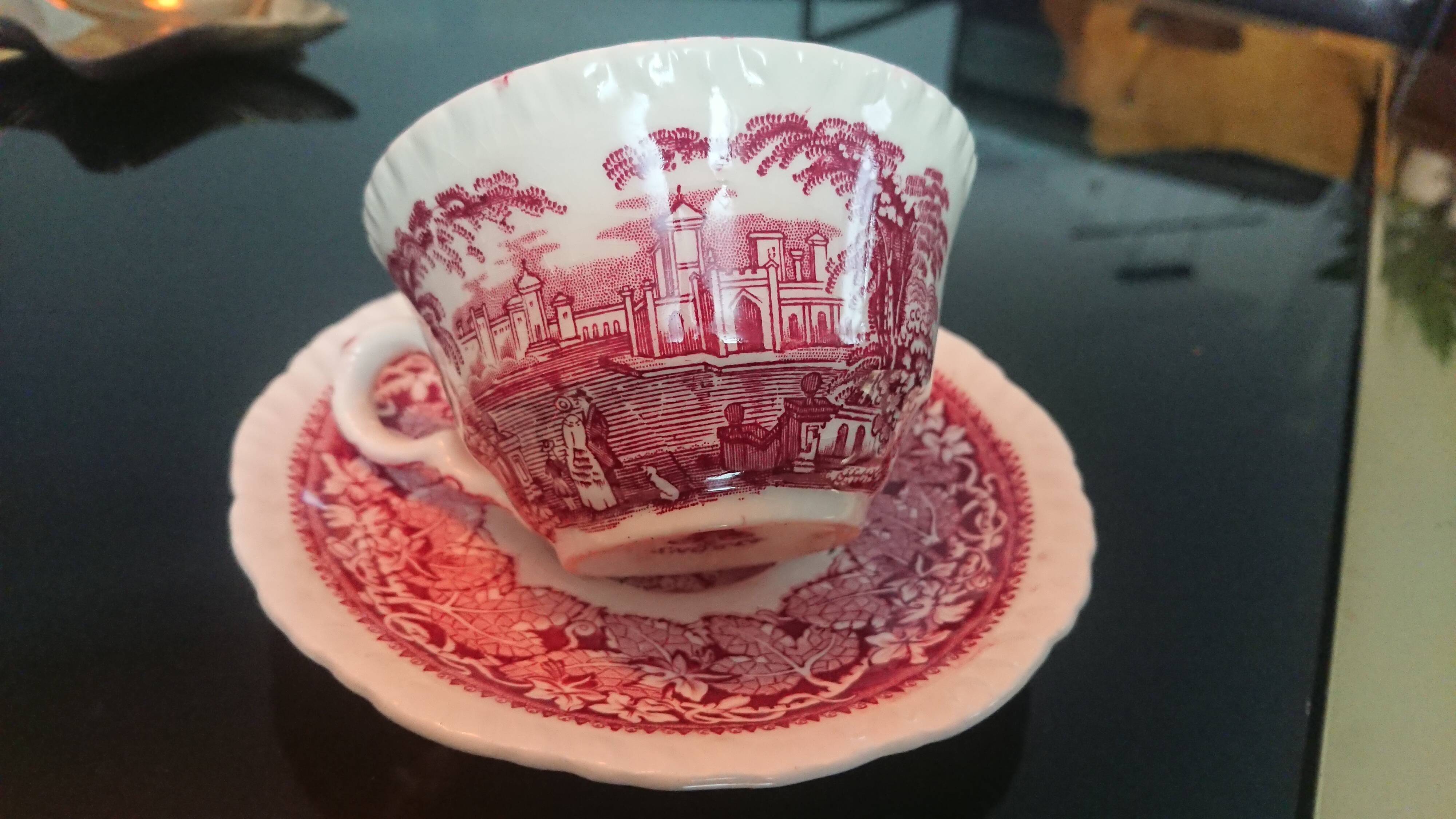 Tea cup and English earthenware saucer