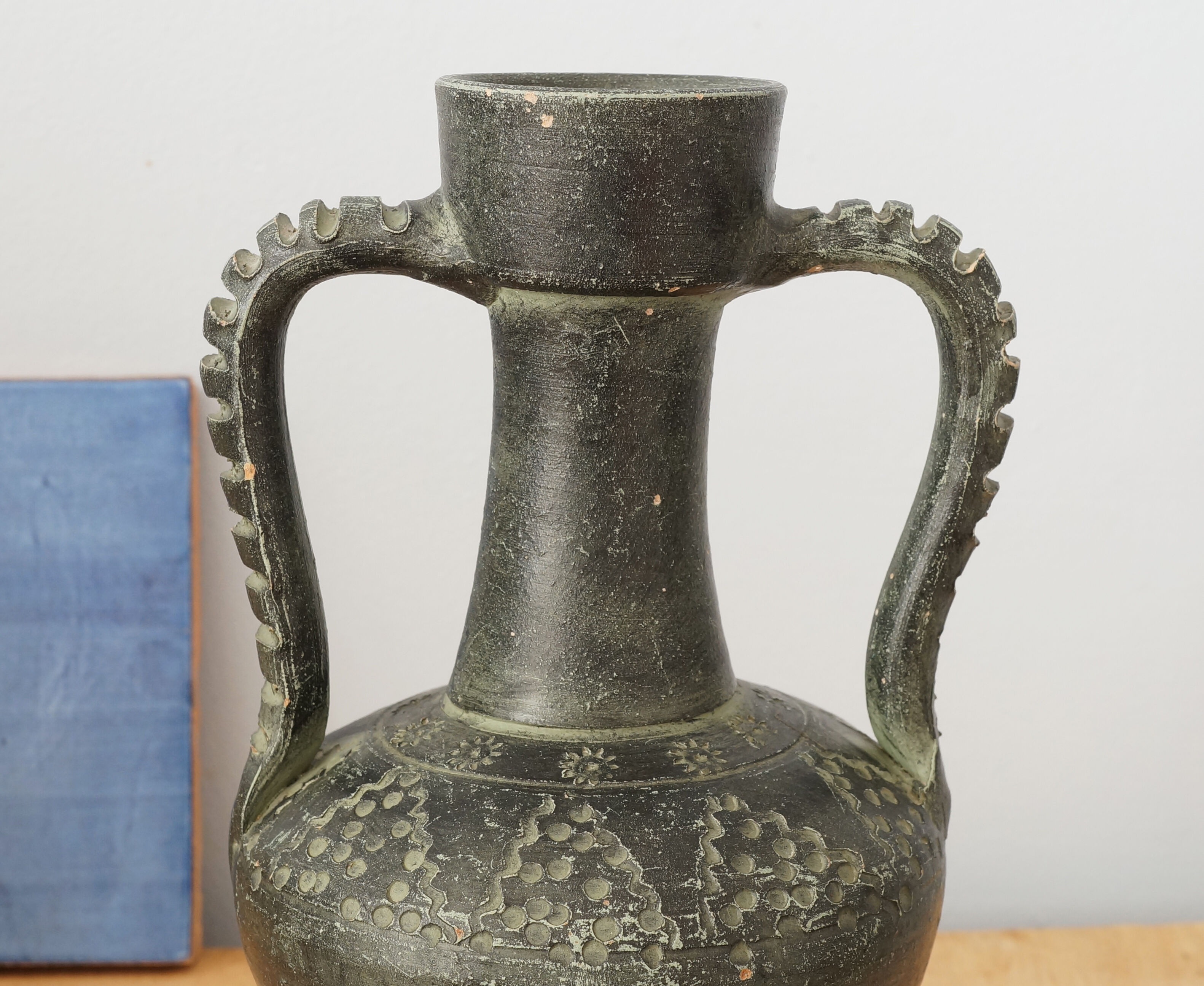 Black vase of antique inspiration in the shape of an amphora, 50s or 60s, vintage