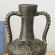 Black vase of antique inspiration in the shape of an amphora, 50s or 60s, vintage