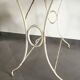 White wrought iron table