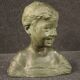 Sculpture in bronze painted terracotta bust of a child