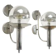 Pair of European mid-century chrome wall sconces with mirrored globe shades