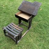 Brown painted wooden school desk for children, vintage 1920s set, slatted seat and storage.