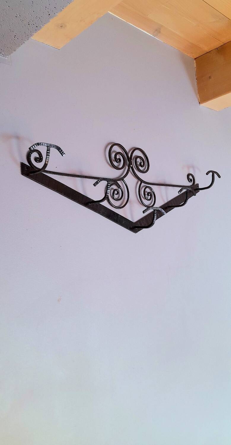 Art Deco wrought iron coat rack.