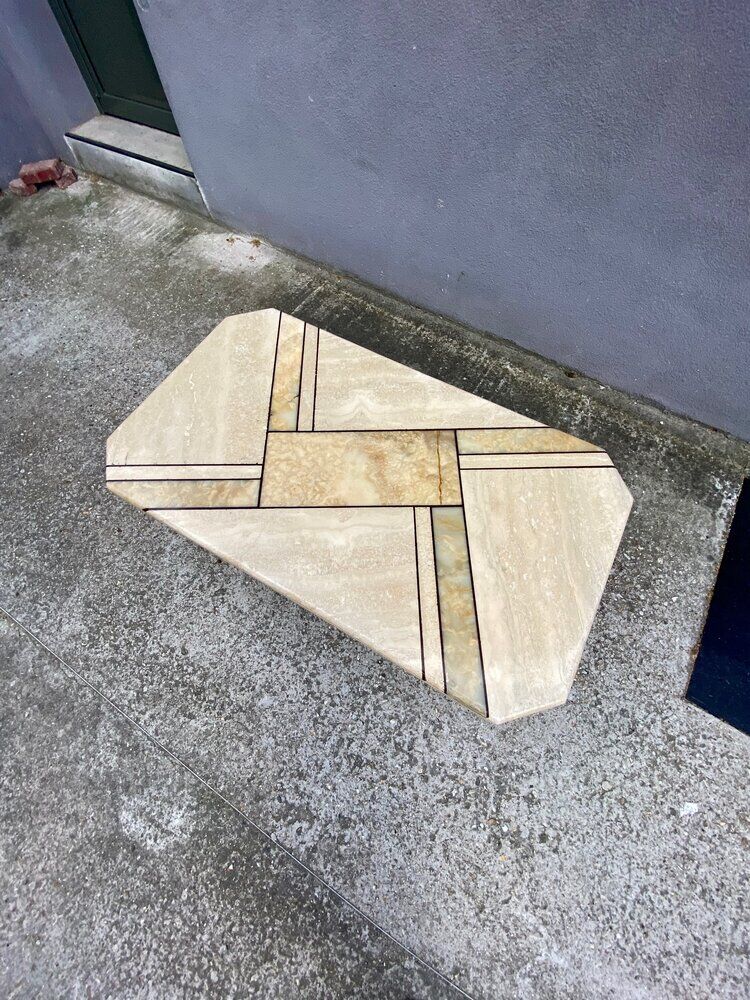 Low table in travertine and onyx 80'