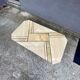 Low table in travertine and onyx 80'