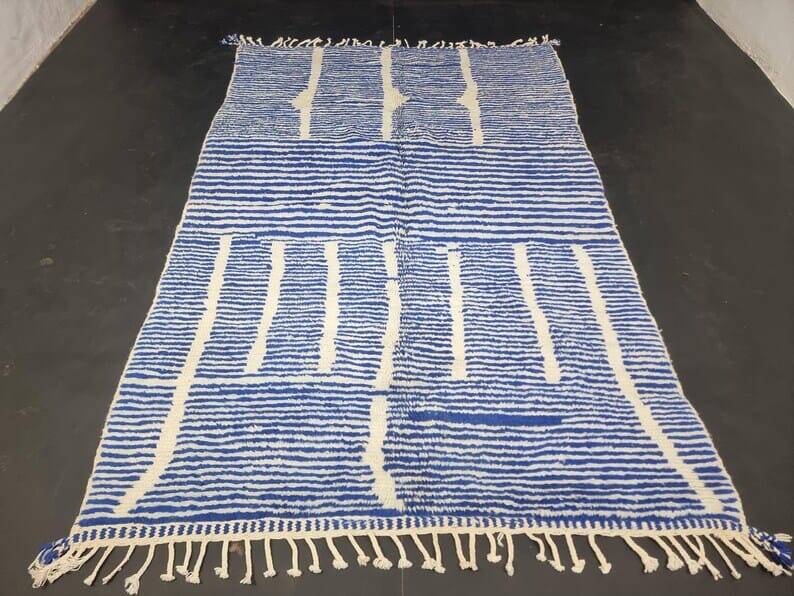 Handwoven Berber rug in blue and white, size 150x250 cm.