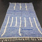 Handwoven Berber rug in blue and white, size 150x250 cm.