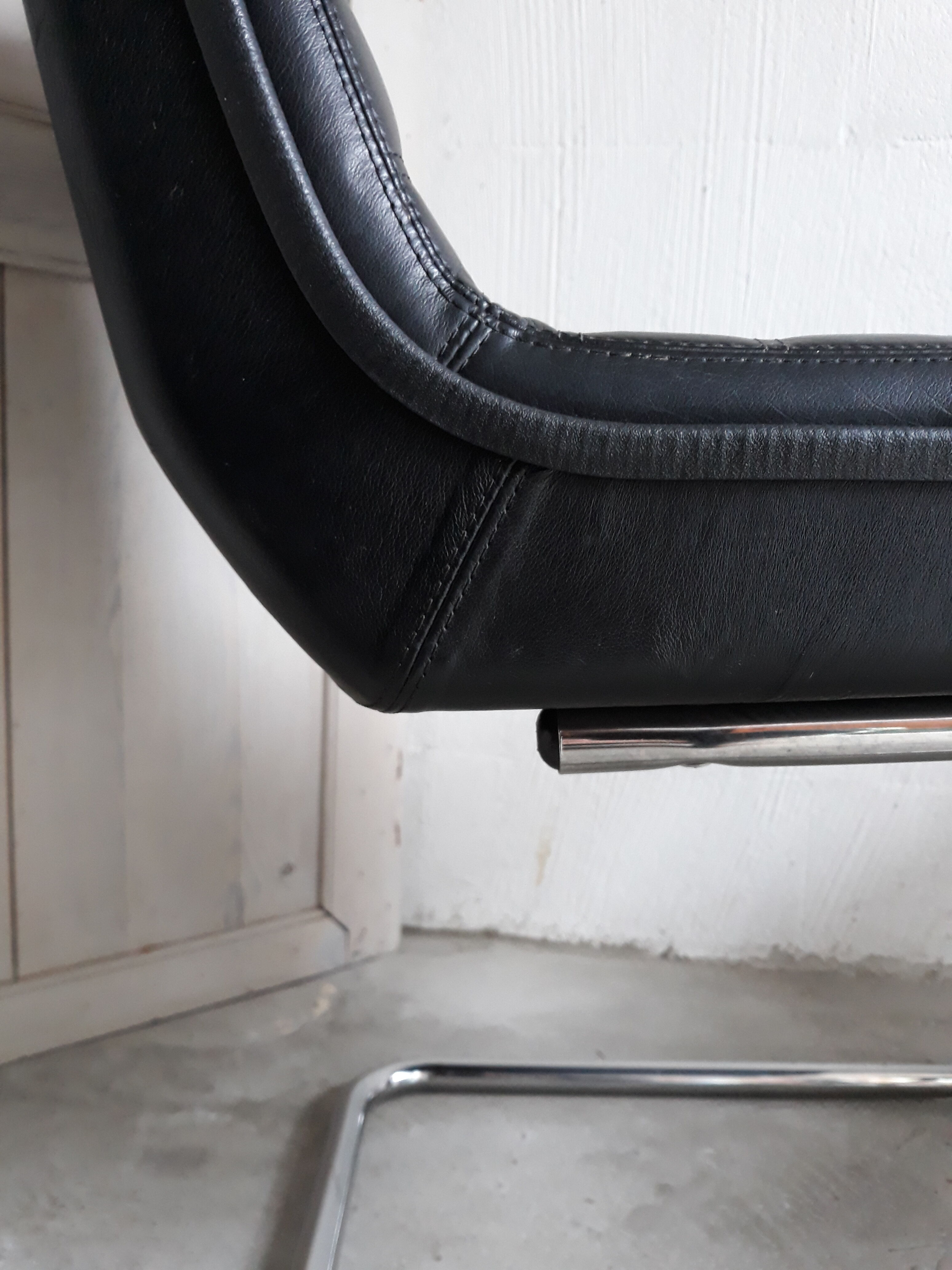 Vintage black leather armchair