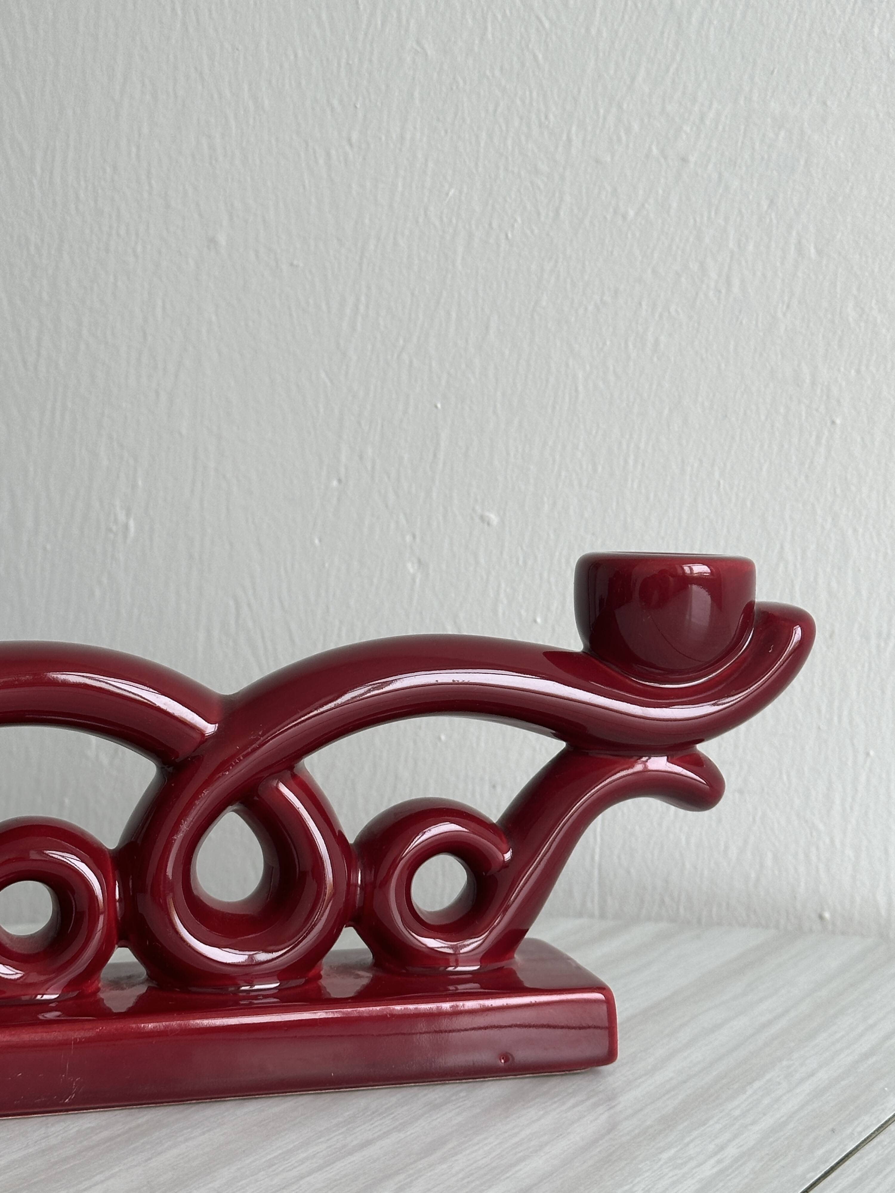 Vintage burgundy red ceramic candlestick