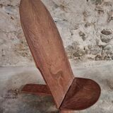 Pair of hand-carved wooden folding chairs – African origin, animal and face motifs, mid-20th century