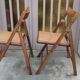 Pair of vintage wooden and cane folding chairs