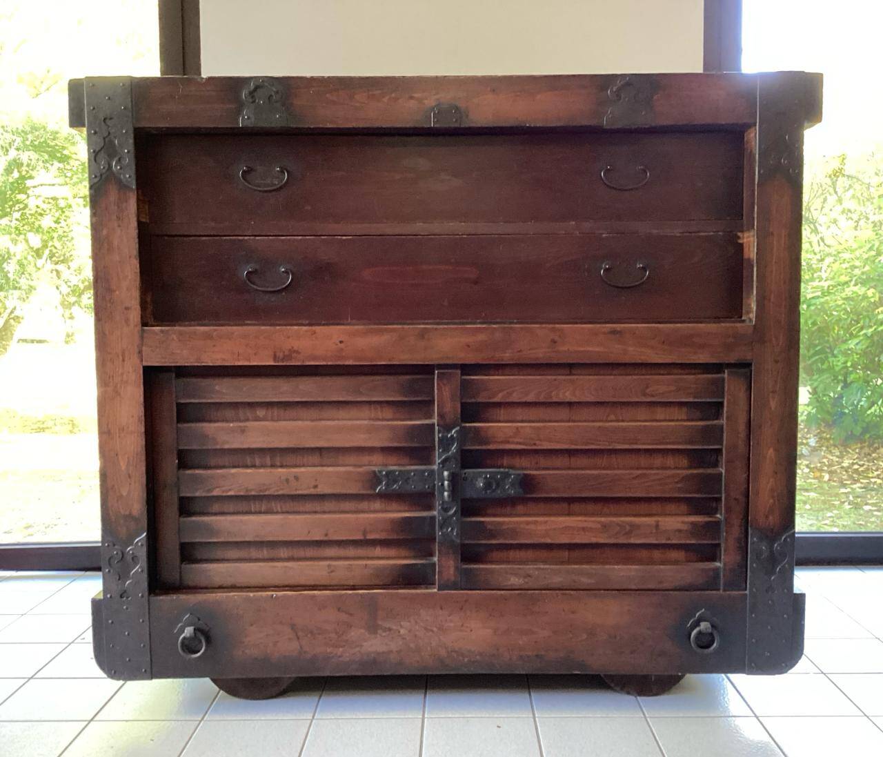Japanese antique wooden chest with black fittings.