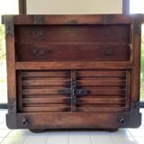 Japanese antique wooden chest with black fittings.