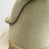 sage green toad armchairs with gold fringe