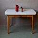 1950s Formica kitchen table with tapered legs and vintage drawer.