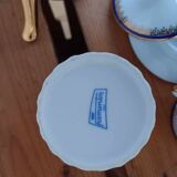 Coffee pot, sugar pot, 1 cup and saucer.