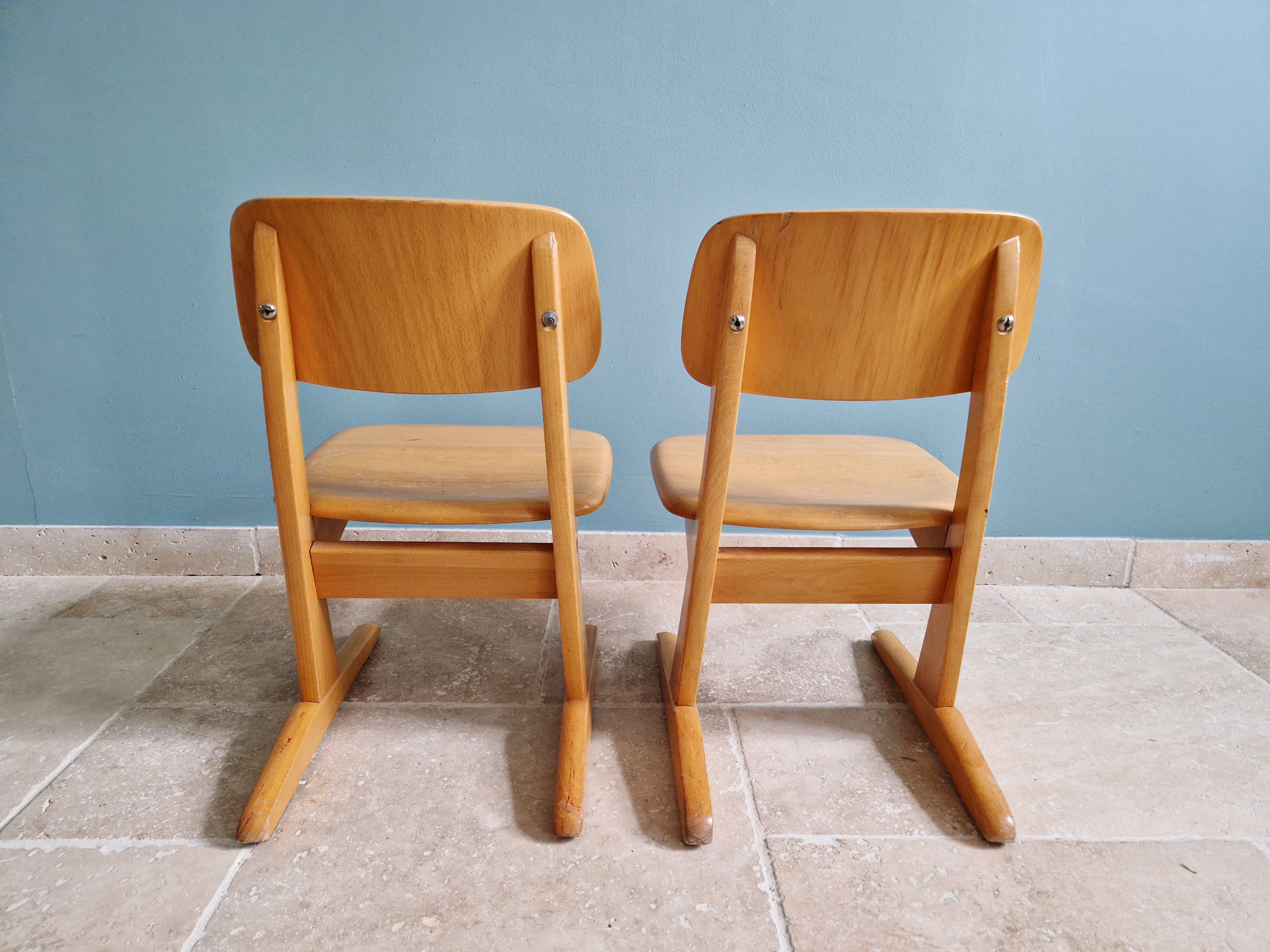 Pair of children's chairs by Casala in solid beech, 1960s.