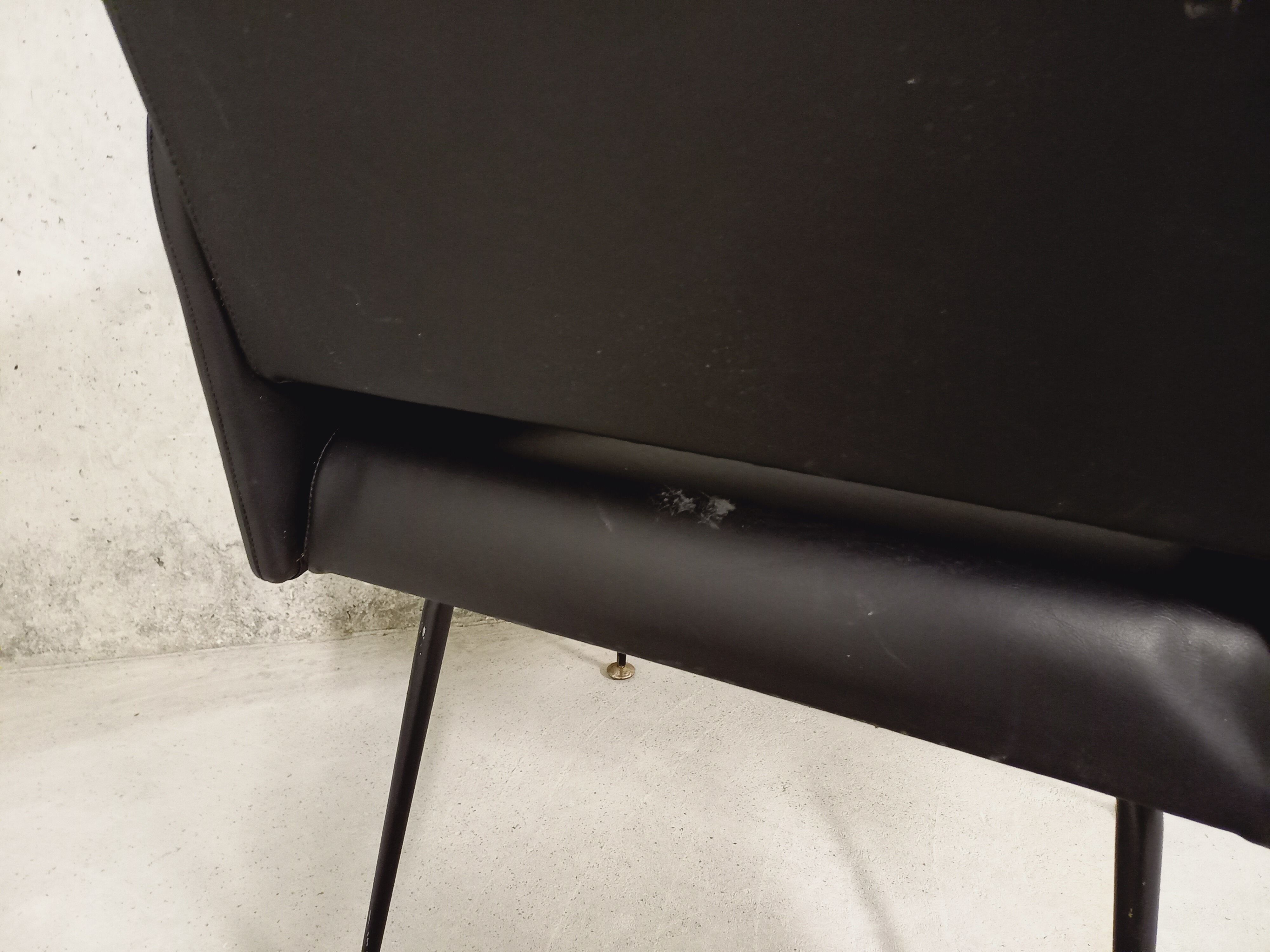 Vintage armchair in skai and black metal 60s