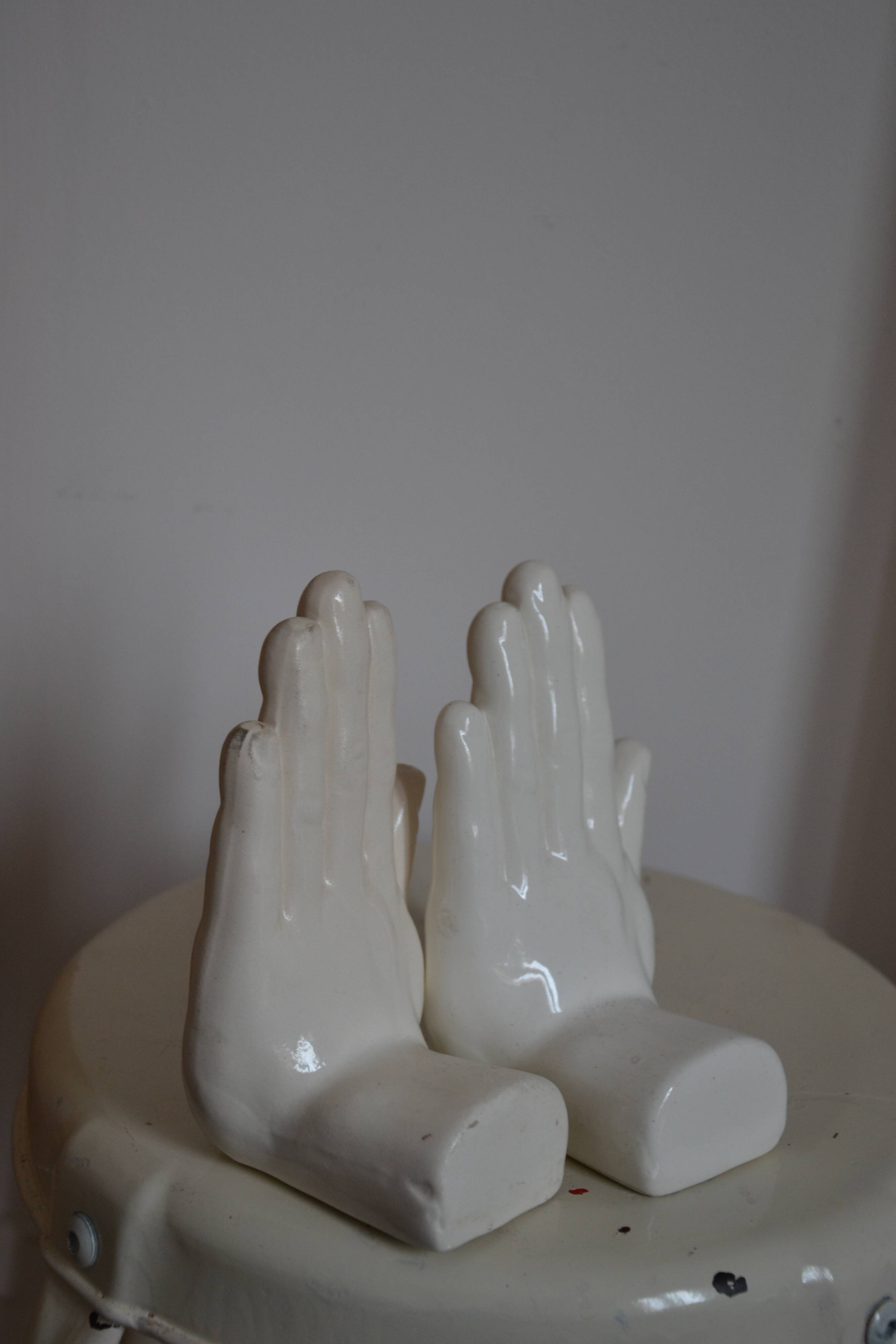 Handends in the shape of vintage white ceramic