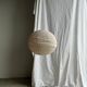 Large round pink Japanese-style suspension made of rattan and natural linen D60.