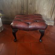 Red leather footrest in Chesterfield style, vintage 1970s.