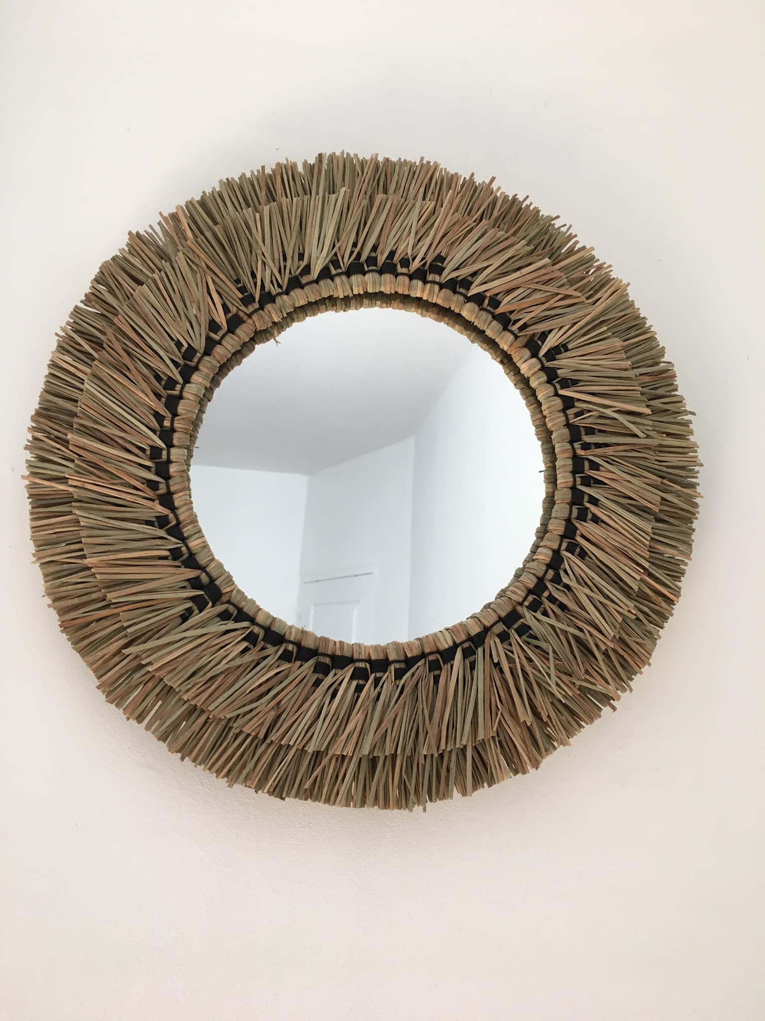 Wall mirror in natural raffia and black cords on wooden support, 37 cm