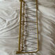 Vintage wall coat rack in gilded metal
