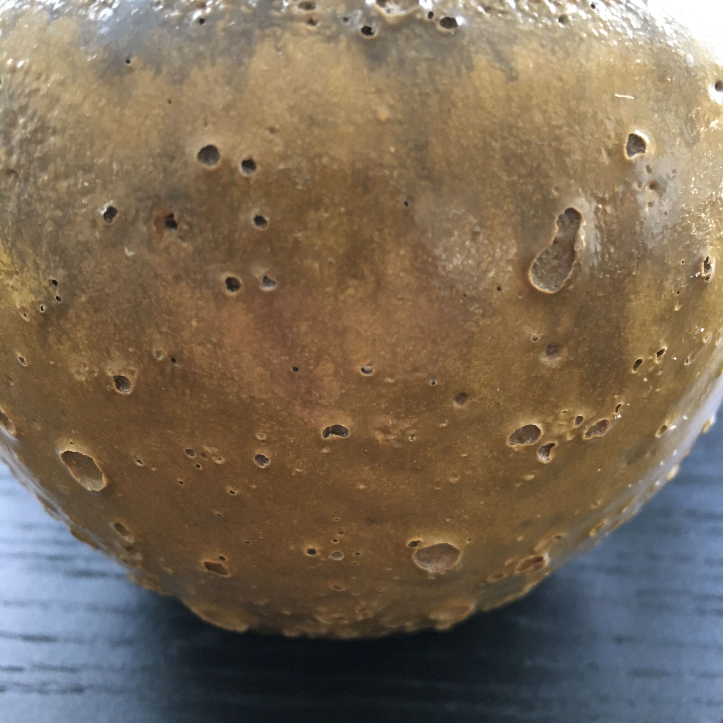 Relief crater ball vase
