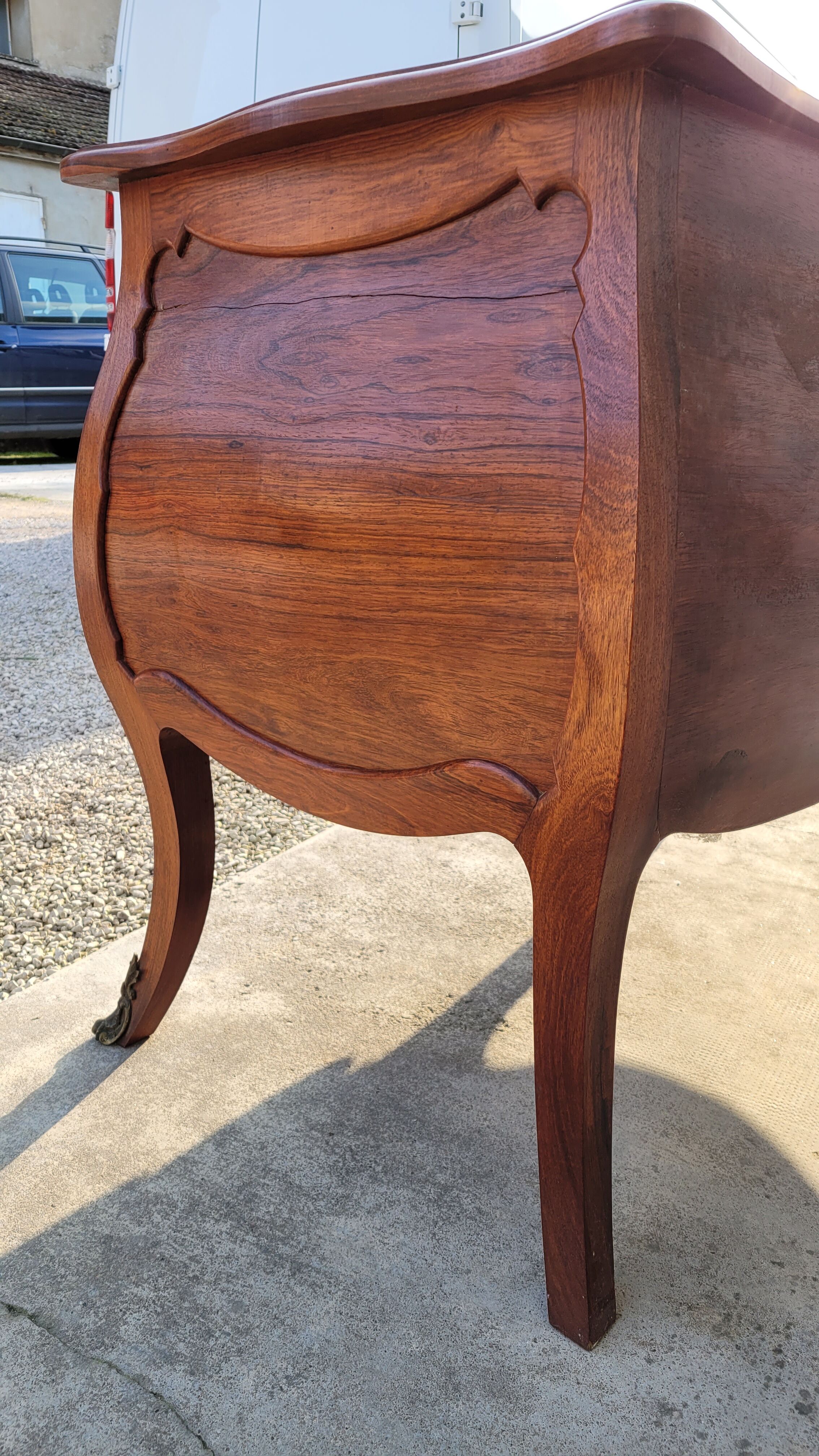 Curved Louis XV style commode in mahogany.