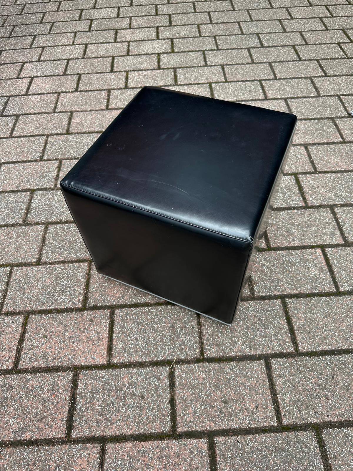 Pair of designer poufs in faux leather