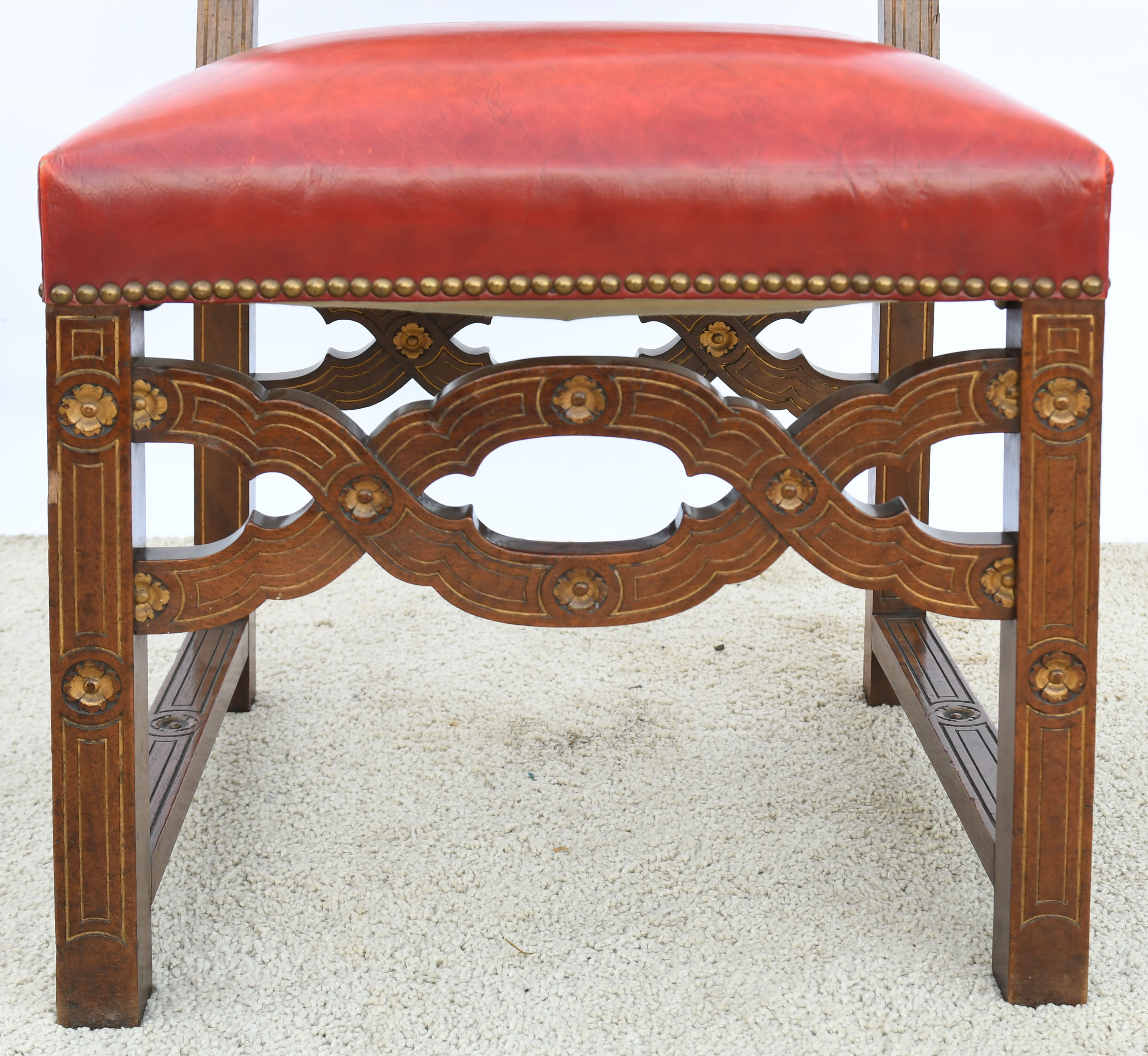 6 red leather chairs