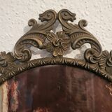 Italian oval frame in bronze and curved glass