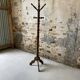 Antique turned wooden coat rack