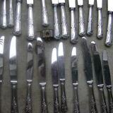 Part of art nouveau style cutlery set. made of silver metal. 48 pieces.