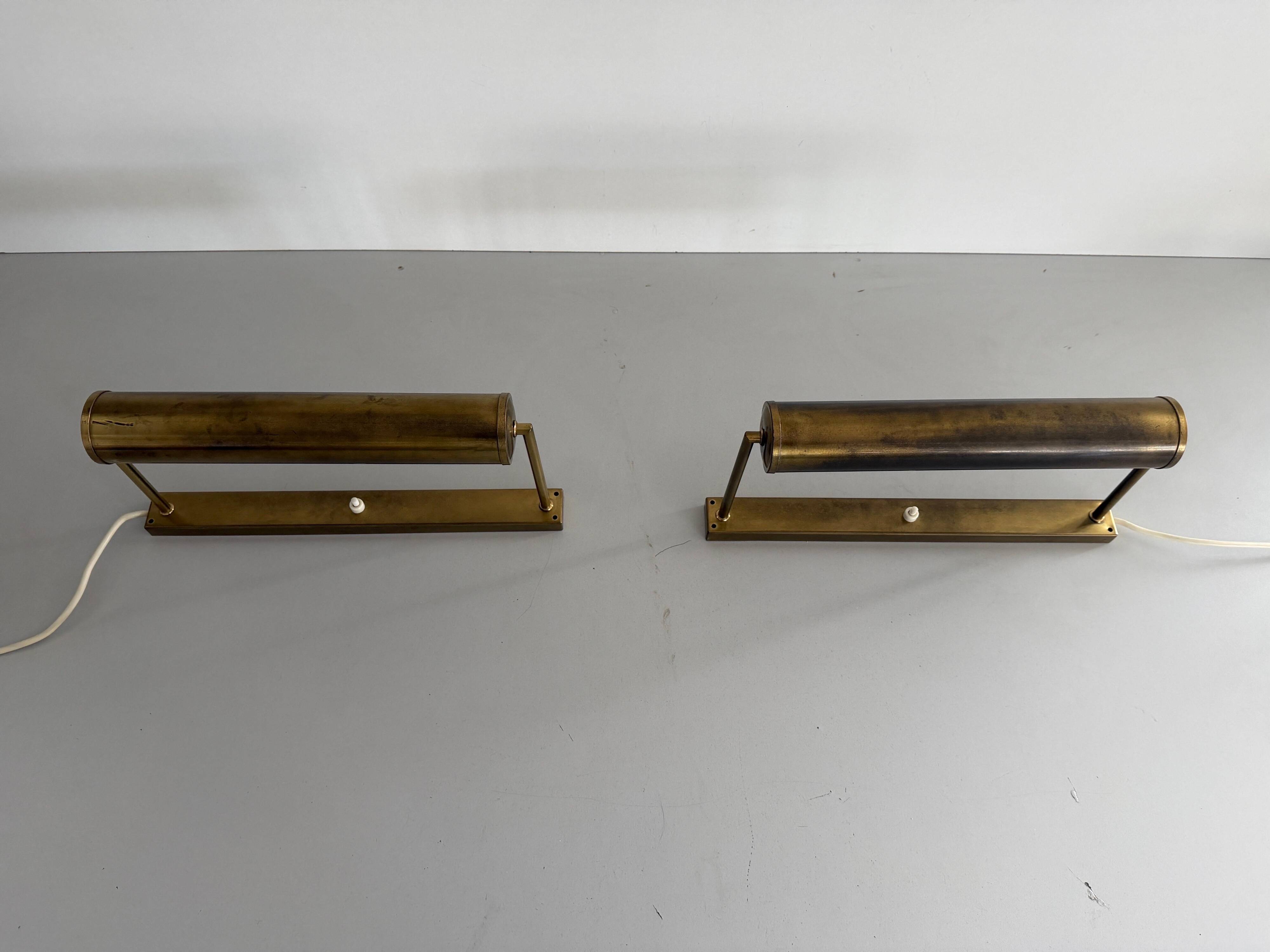 Pair of brass wall lights with adjustable heads from the mid-20th century, 1960, Germany.