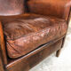 Dark brown sheep leather wingback armchair