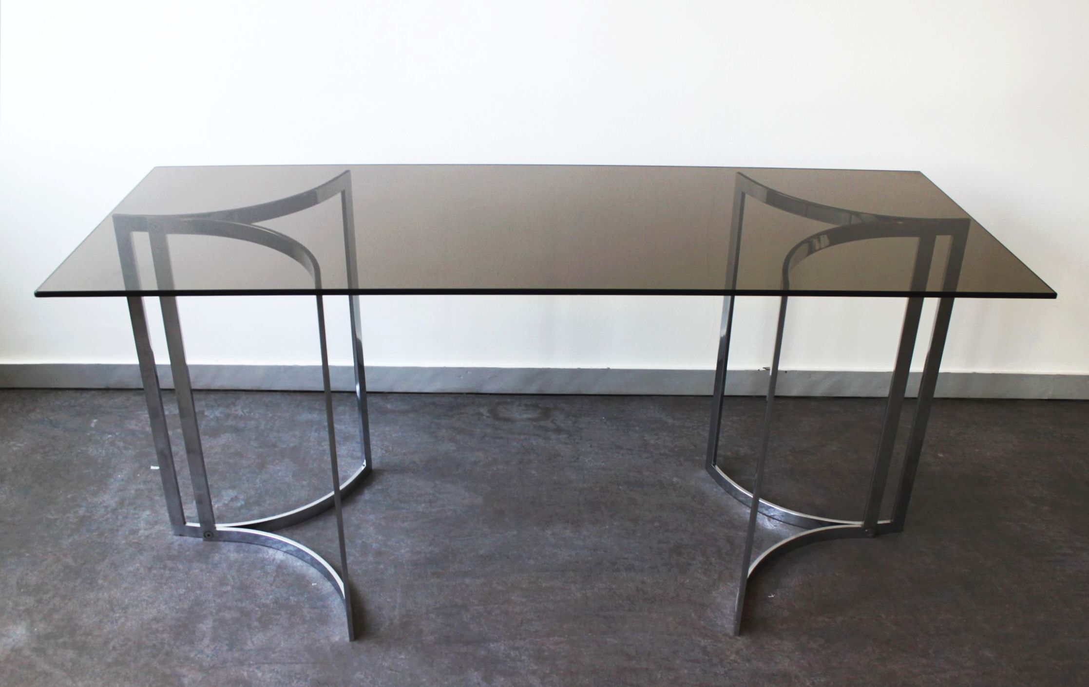 Smoked glass console with chrome legs, 1970.