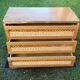 Vintage oak-plated chest of drawers and rattan with compass base as it is.