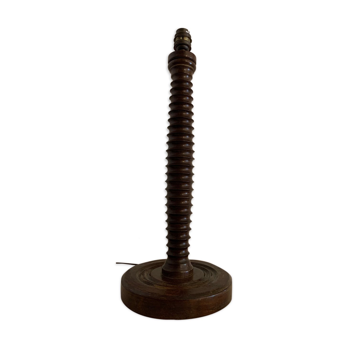 Turned wooden lamp foot in the shape of a warhead