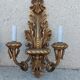Paire d’appliques en bois doré sculpté