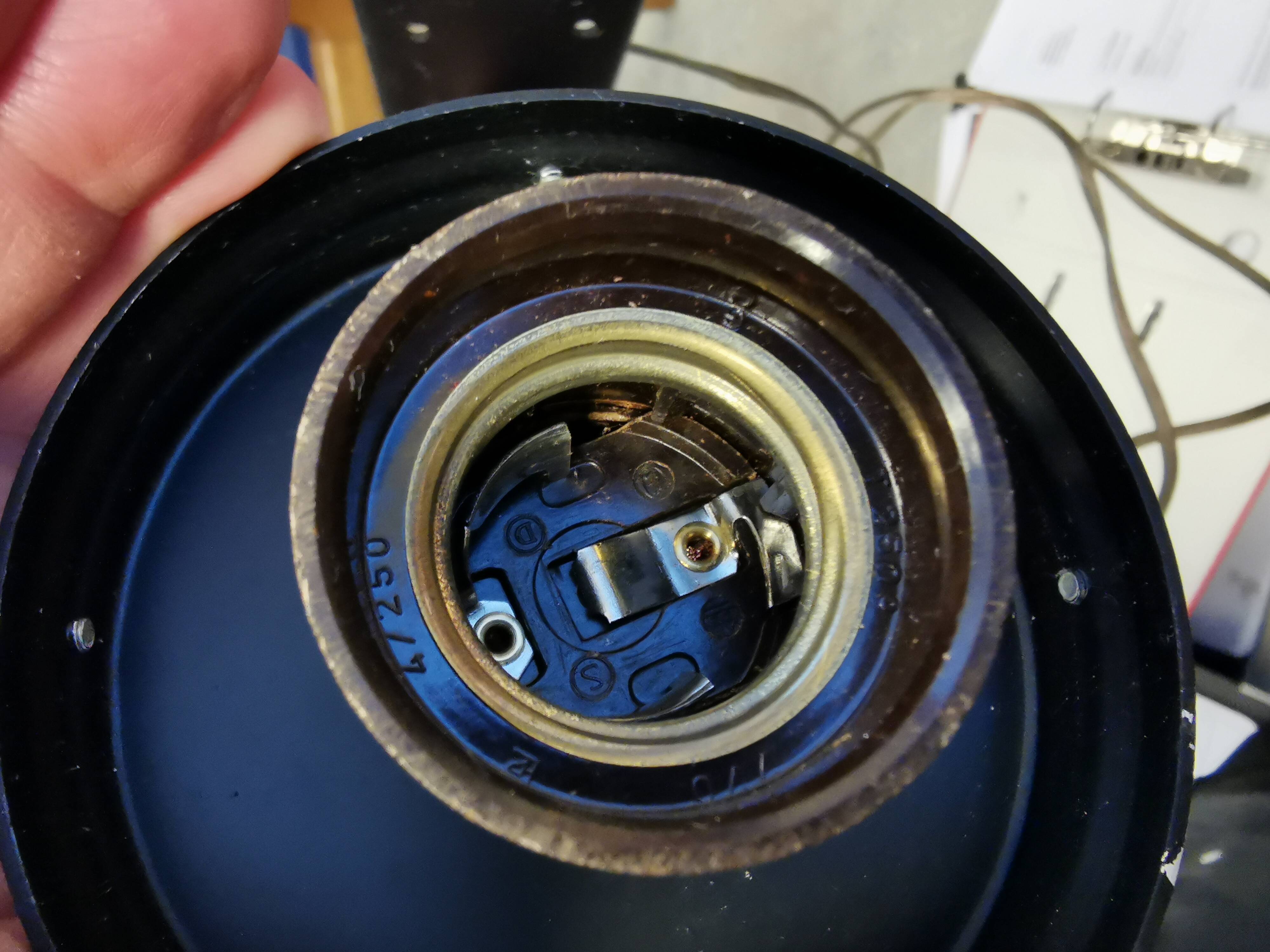 Wall light, made in black metal frame with olive green glass shade