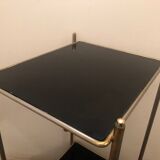Gold metal harness with two black colored glass trays
