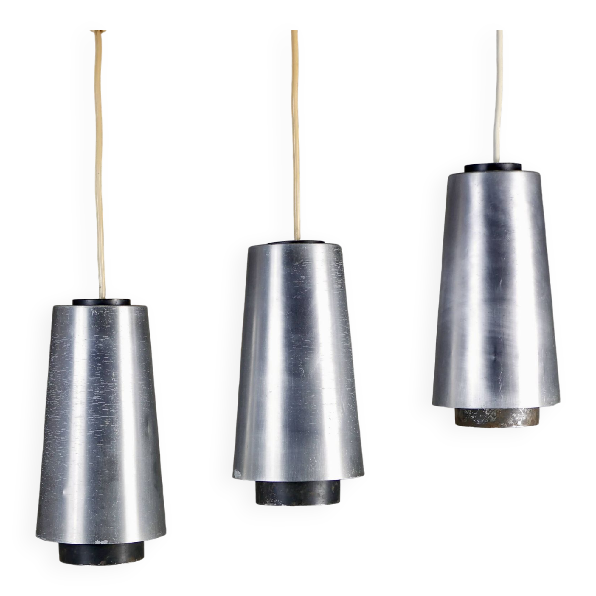 Trio of Raak steel pendant lights, 1960s