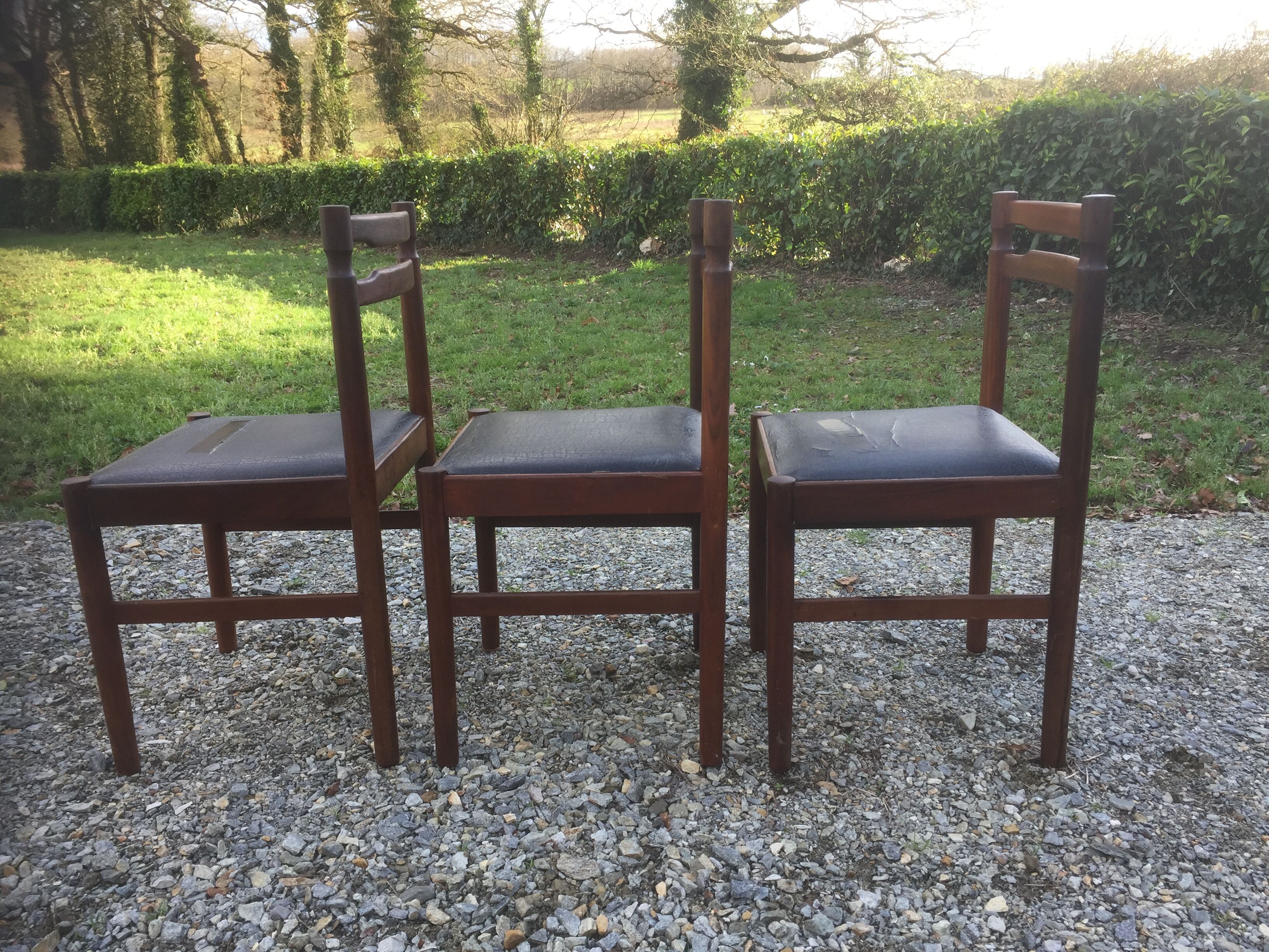 Vintage scandinavian teak chairs, black skaï seats as it is