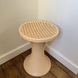 Tam Tam Stamp stool Made in France with a woven rattan-style seat.